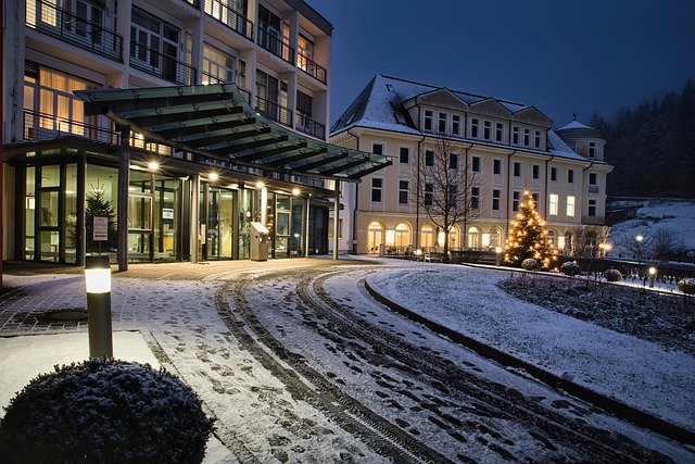 Family enjoying a Christmas vacation in a snowy European village