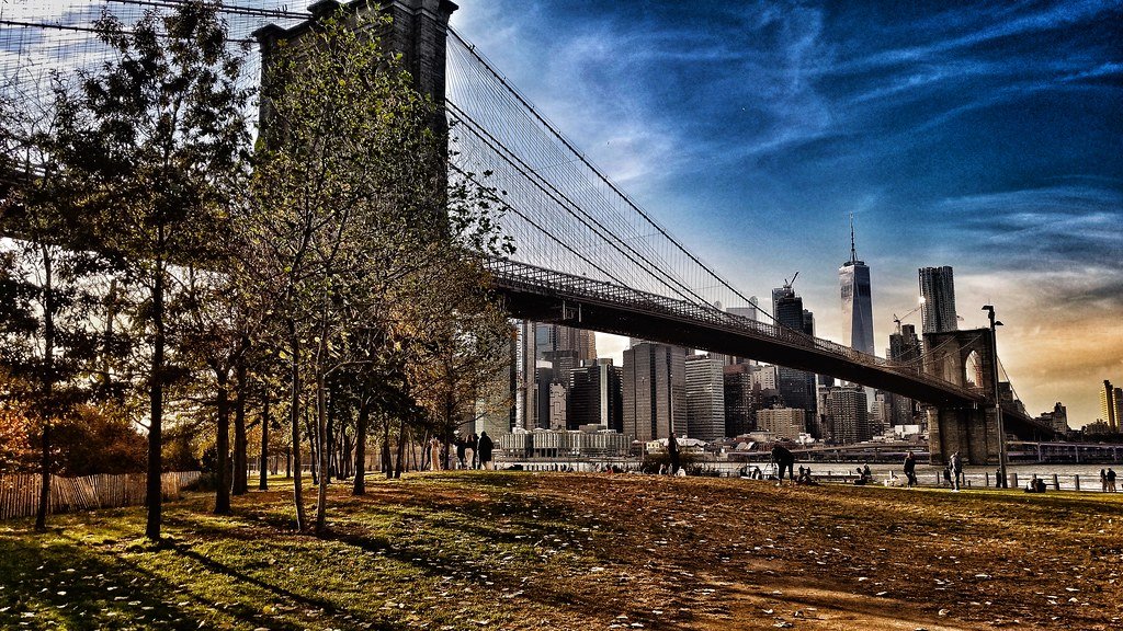 The Brooklyn Bridge spanning the East River with the Manhattan skyline behind