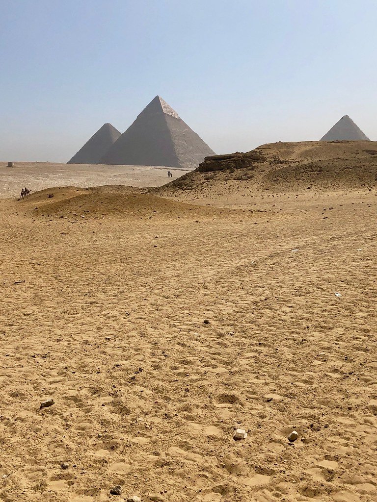 The pyramids of Giza rising above the desert outside Cairo