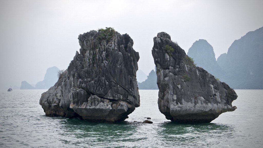 Limestone karsts rising from the water in Ha Long Bay, Vietnam